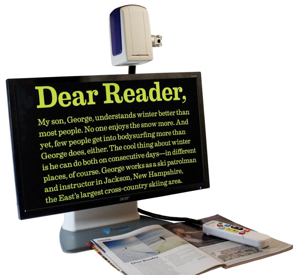Assistive technology showing hardware that magnifies and transfers text from a printed document to a screen to make it easier for a person with sight loss to read